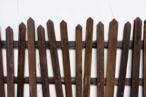 Wooden fence on the wall — Stock Photo, Image
