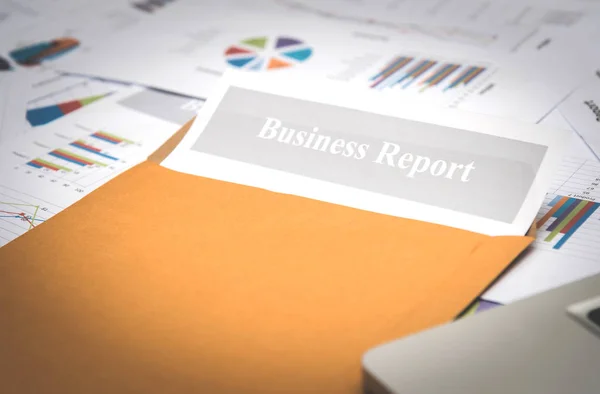 Business report in envelope