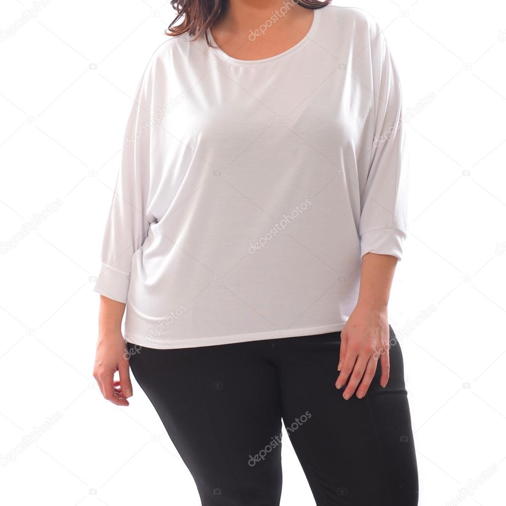 Portrait of plus size model woman wearing XXL white sweater sweatshot and black leggins posing isolated on white background.