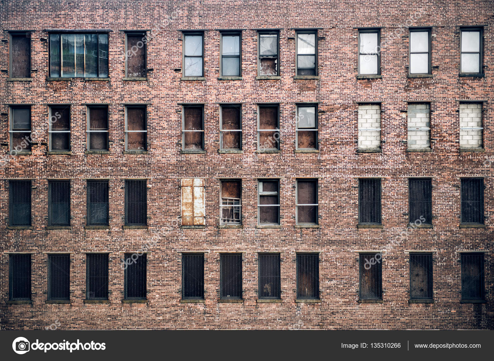 Front View Of A Boarded Up Abandoned Brick Skyscraper Building Windows From The Street In New York City Photo By JANIFEST Front View Of A Boarded Up Abandoned Brick Skyscraper Building Windows From The Street In New York City Photo By JANIFEST