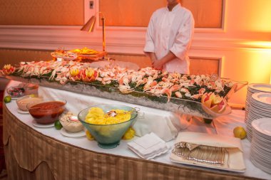 Buffet table with seafood with shrimp and crabs on luxury event banquet. Catering service concept. clipart