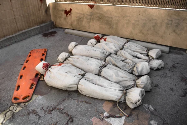 Death bodies in bags after terrorist attack or virus epidemy — Stock Photo, Image