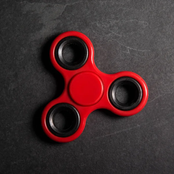 Red spinner Fidget dedo estrés ansiedad alivio juguete — Foto de Stock
