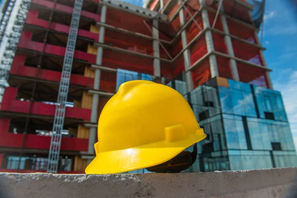 People on the construction and safety technic concept photo. Yellow helmet on the construction site. — Stock Photo, Image