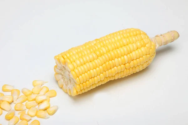 Fresh corn on cobs on texture background, closeup, top view — Stock Photo, Image