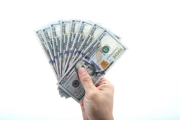 Beyazlar üzerinde izole edilmiş erkeklerin elindeki para hayranı..