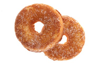 Beyaz arkaplanda kırpma yolu ile izole edilmiş beyaz serpiştirilmiş donut