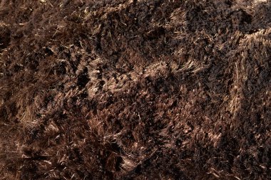 Kahverengi halı, desenli numune görüntüsü, boş boş telif alanı arka planı. Koyu renk