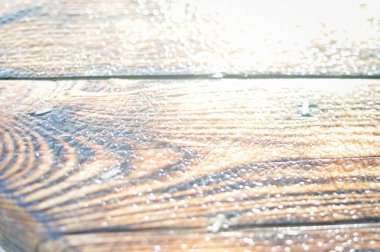 Kahverengi ahşap yüzey doğal dokulu arka plan, makro fotoğrafçılığı kapat. Sezon dışı yoğunlaştırılmış parlak yüzey