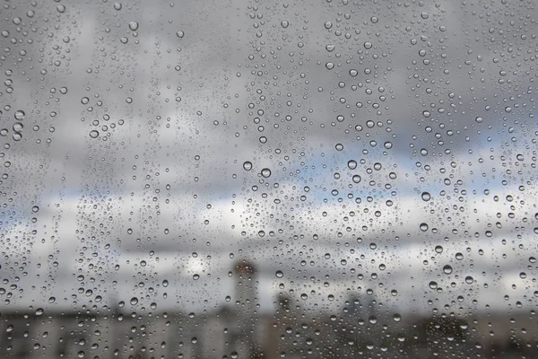 Regendruppels op glas — Stockfoto
