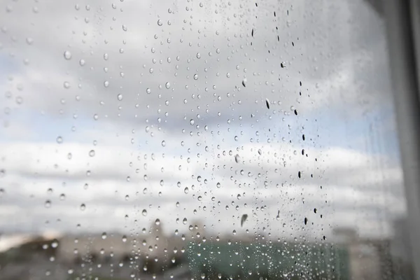 Gotas de chuva em vidro — Fotografia de Stock