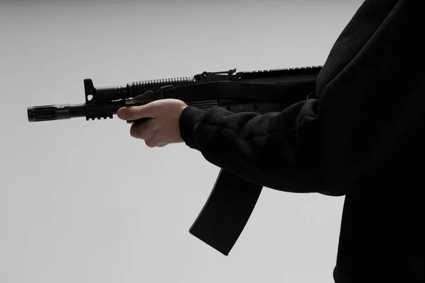 Man in mask With gun on white background