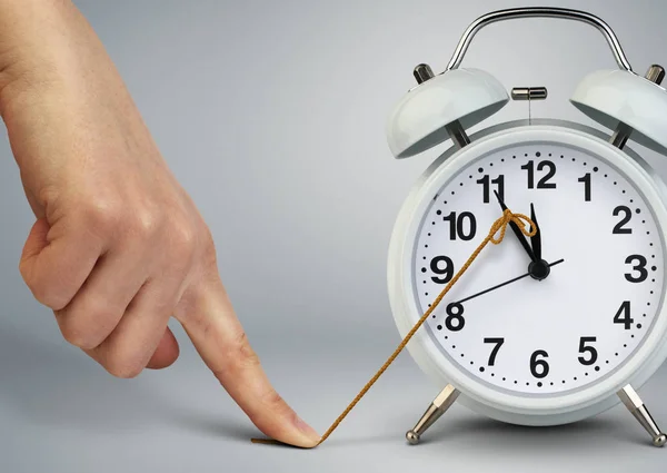 Hand stop time on alarm clock, deadline concept — Stock Photo, Image