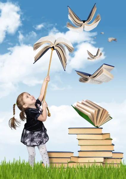 Elementary education creative concept , child girl with flying b — Stock Photo, Image
