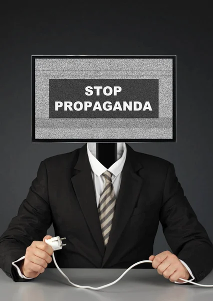 man with tv head, stop mass media propaganda concept