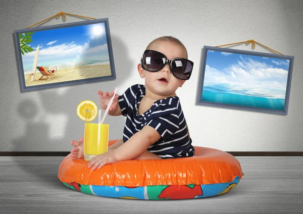 Funny child rest on swimming ring at home, as on the beach. Vaca — Stock Photo, Image