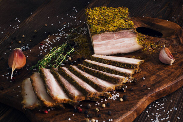 Sliced smoked brisket with garlic