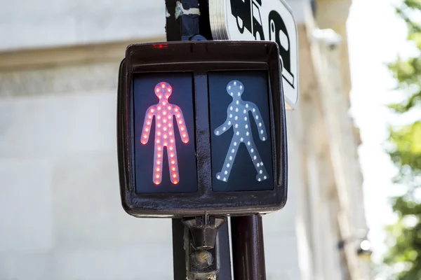 Red traffic light for pedestrians in paris — Stock Photo, Image