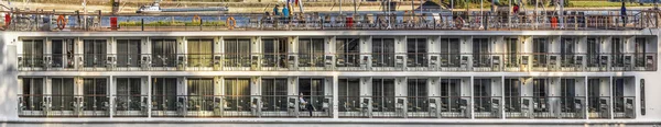 People enjoy river cruise ship with cabins on river Rhine. — Stock Photo, Image