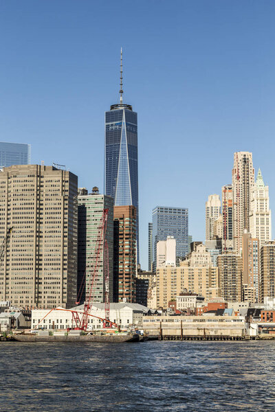 NEW YORK, USA - OCT 23, 2015: view to new skyscraper one World trade center from Brooklyn. The one world trade center is 541 m high.