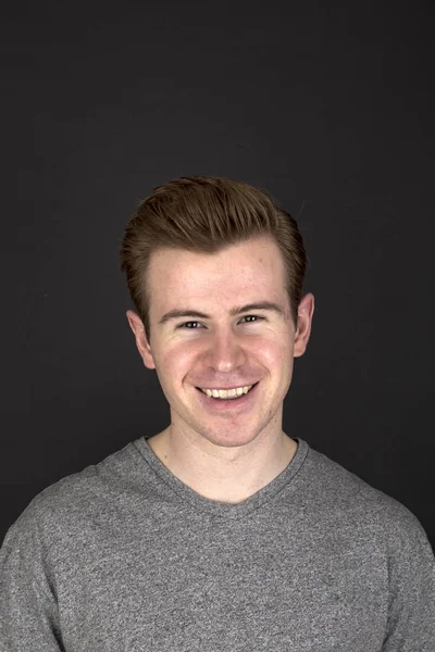 Portrait  of positive looking young man — Stock Photo, Image