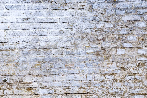 Old vintage brick wall with white paint — Stock Photo, Image