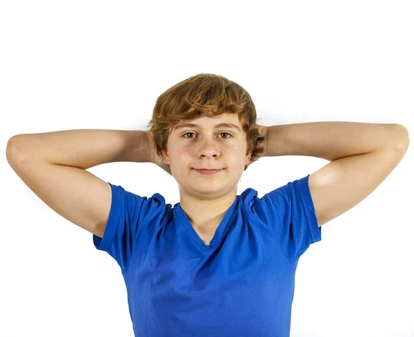 Cool boy keeps his arms behind his head — Stock Photo, Image