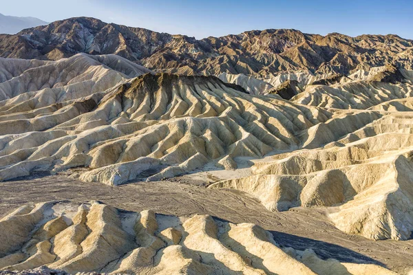 Picturesque soft waves from multi-coloured sandstone. Death vall — Stock Photo, Image