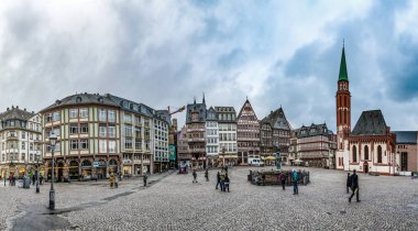 people visit the Roemerberg, the main market place at historic Frankfurt clipart