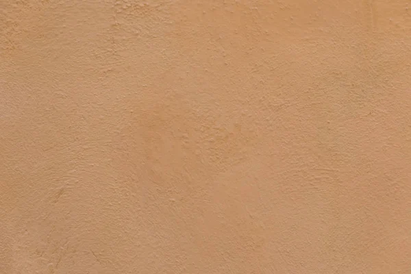 Mur de plâtre orange peint d'une vieille maison dans la provence — Photo