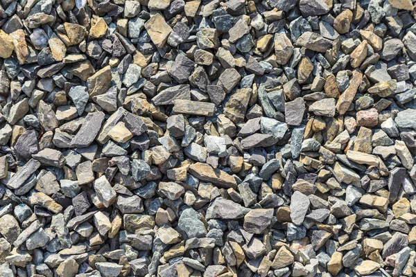 Background of small rough stones for paving a way — Stock Photo, Image