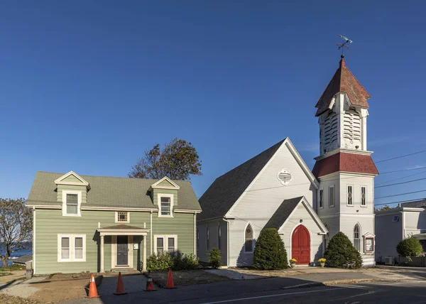 Kirke og gamle vintage hus i Rockport - Stock-foto