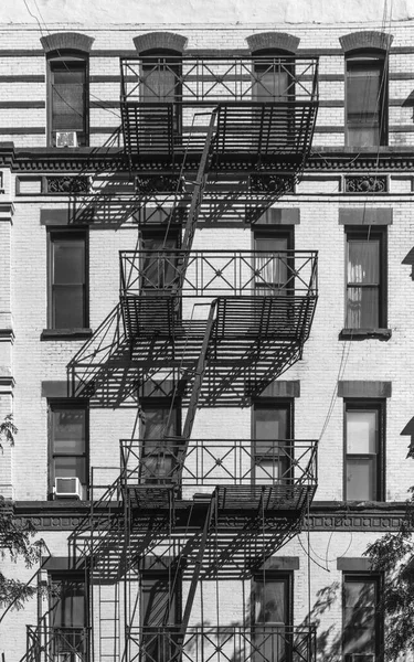 iron fire ladder at the facade of an old historic house in New Y