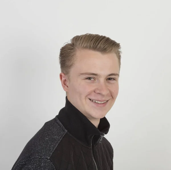 Handsome teenage boy in black shirt — Stock Photo, Image