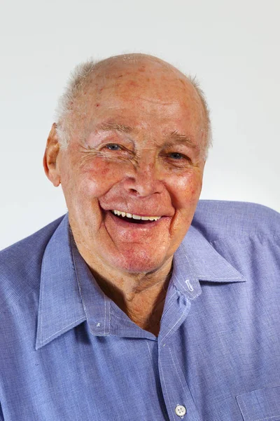 Portrait of laughing happy elderly man — Stock Photo, Image