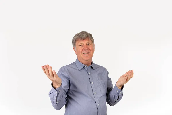 Portrait of positive looking mature man in studio — Stock Photo, Image