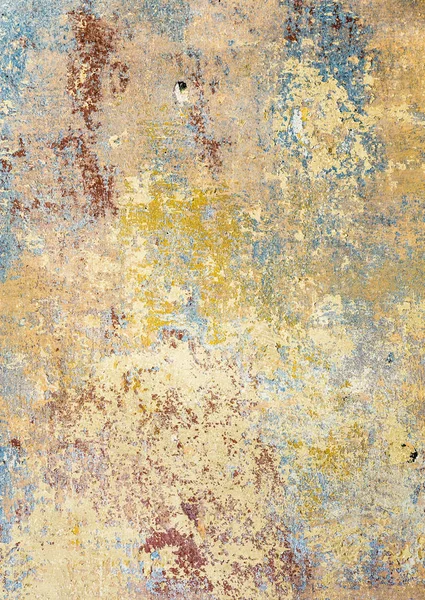 Old grunge wall of an old house with remainings of color — Stock Photo, Image