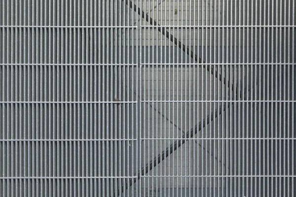 Pattern of iron grid in harmonic structure — Stock Photo, Image