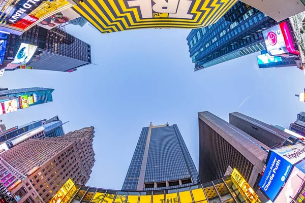 Neon advertising of News, brands and theaters at times square in late afternoon — Stock Photo, Image