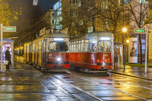 Vienna - famous street car by night with reflection at the stree — Stock Photo, Image