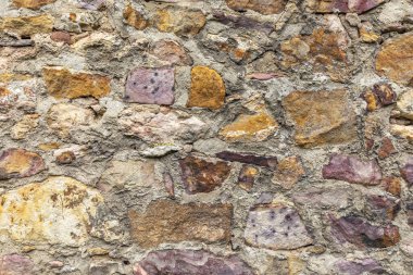 Ahenkli arka plan olarak eski tarihi bir kale duvarı.