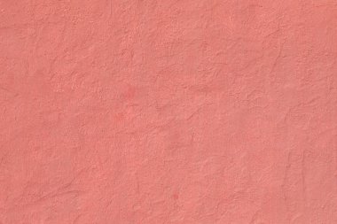 harmonik arkaplan olarak yapısı ile kırmızı boyanmış alçı duvar