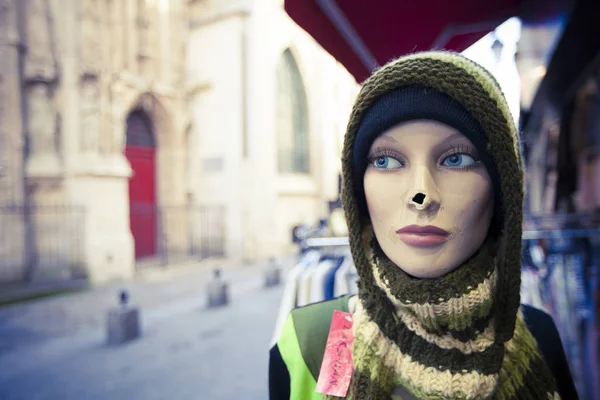 Mannequins head in street shop