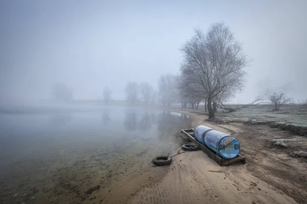 River bank in the mist