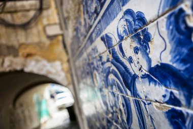 Azulejo tiles in an alley in Lisbon clipart
