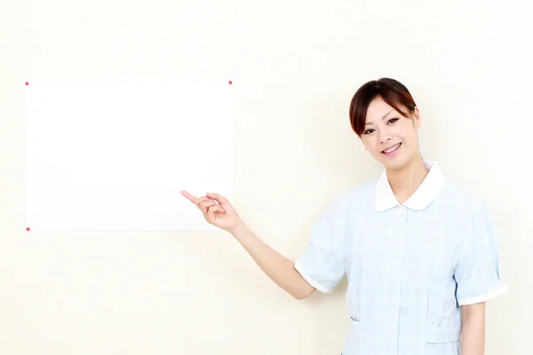 Junge asiatische Krankenschwester — Stockfoto