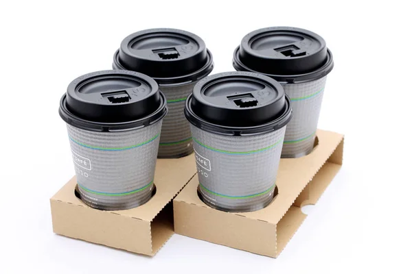 Paper cups of coffee in holder — Stock Photo, Image