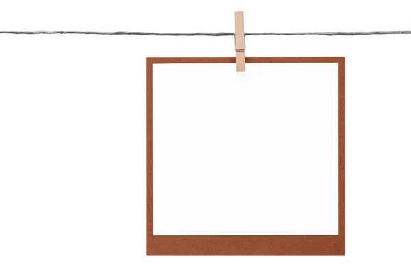 Fotoram som hängde på rep med klädnypa — Stockfoto