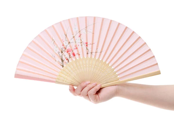 Hand holding folding fan — Stock Photo, Image