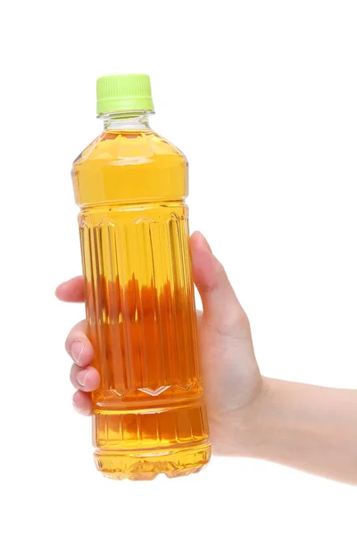 Hand hält Flasche japanischen Tee — Stockfoto